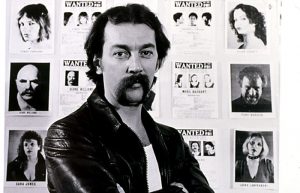 Joey Skaggs with Bad Guys Talent Management Agency Wanted Posters